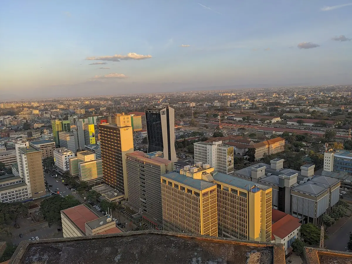 Nairobi's central business district seen from above in warm golden-hour light